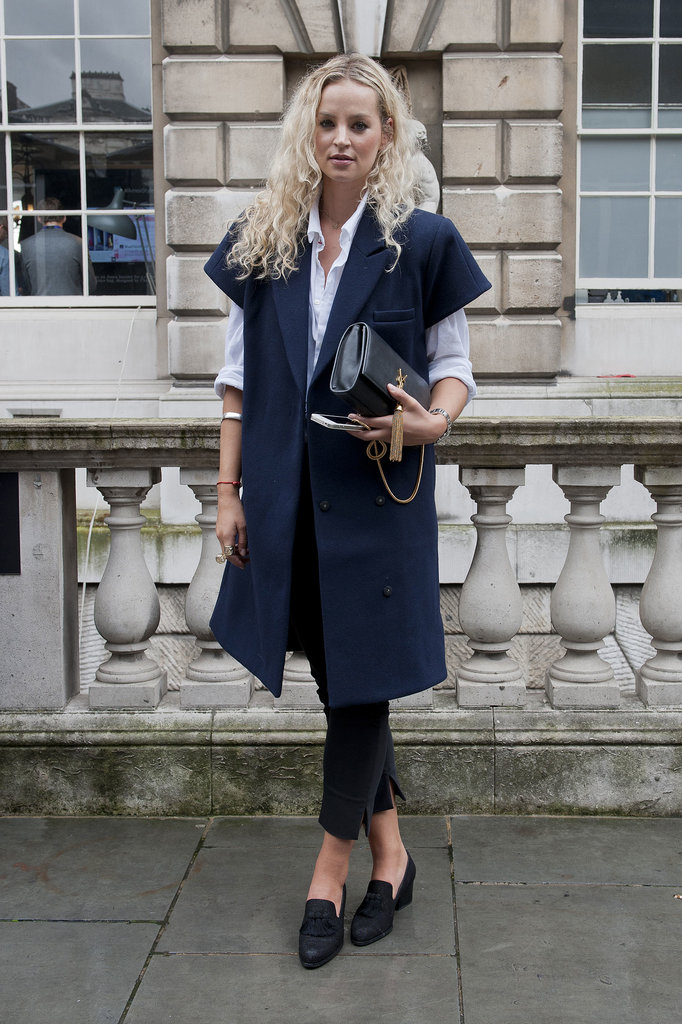 A sleeveless blazer gave this white and black look a polished finish.
A sleeveless blazer gave this white and black look a polished finish.