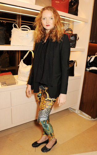 Lily Cole helped open the Longchamp flagship store in bold pants that she styled with a black topper.
Lily Cole helped open the Longchamp flagship store in bold pants that she styled with a black topper.