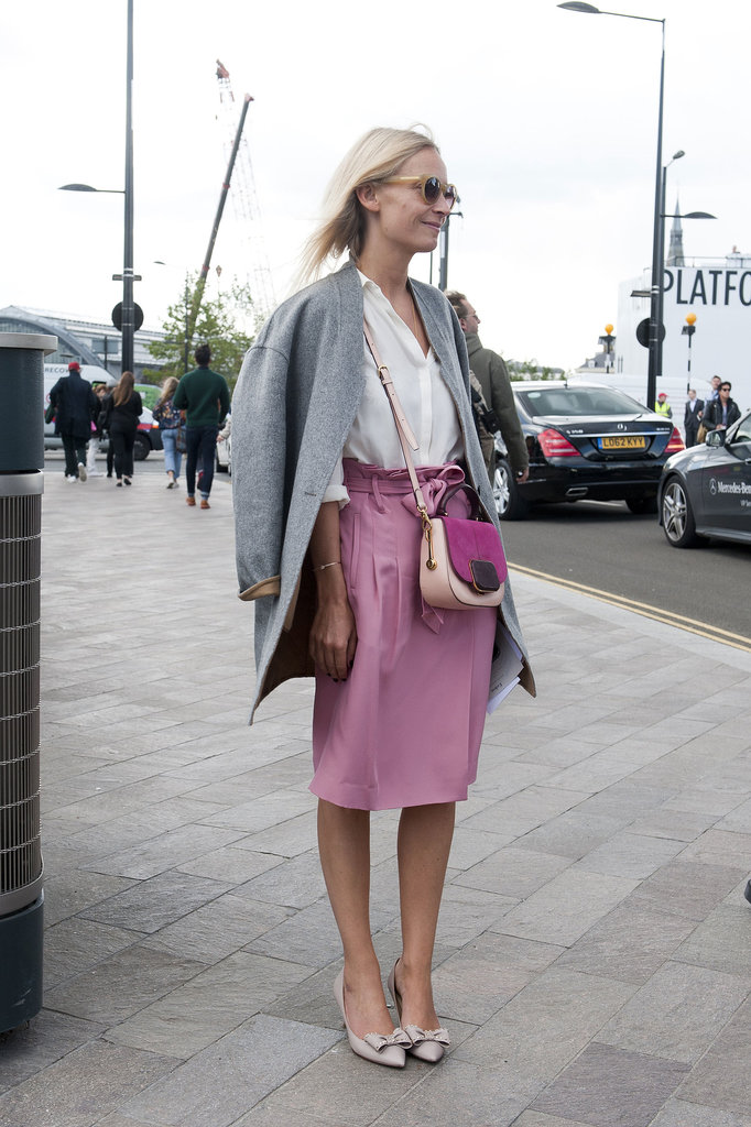 Not too girlie, but with bows on her heels and pink on her skirt, this look is completely lovely.
Not too girlie, but with bows on her heels and pink on her skirt, this look is completely lovely.