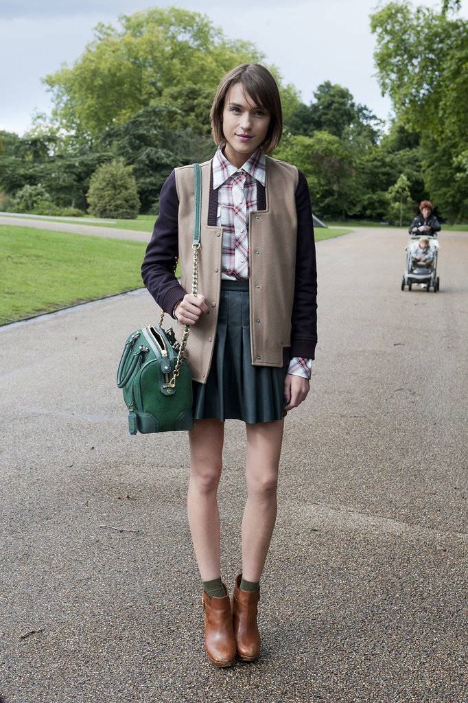 Blogger Ella Catliff borrowed a bit from the boys and outfitted her pleated leather skirt with a button-down and a varsity jacket.
Blogger Ella Catliff borrowed a bit from the boys and outfitted her pleated leather skirt with a button-down and a varsity jacket.