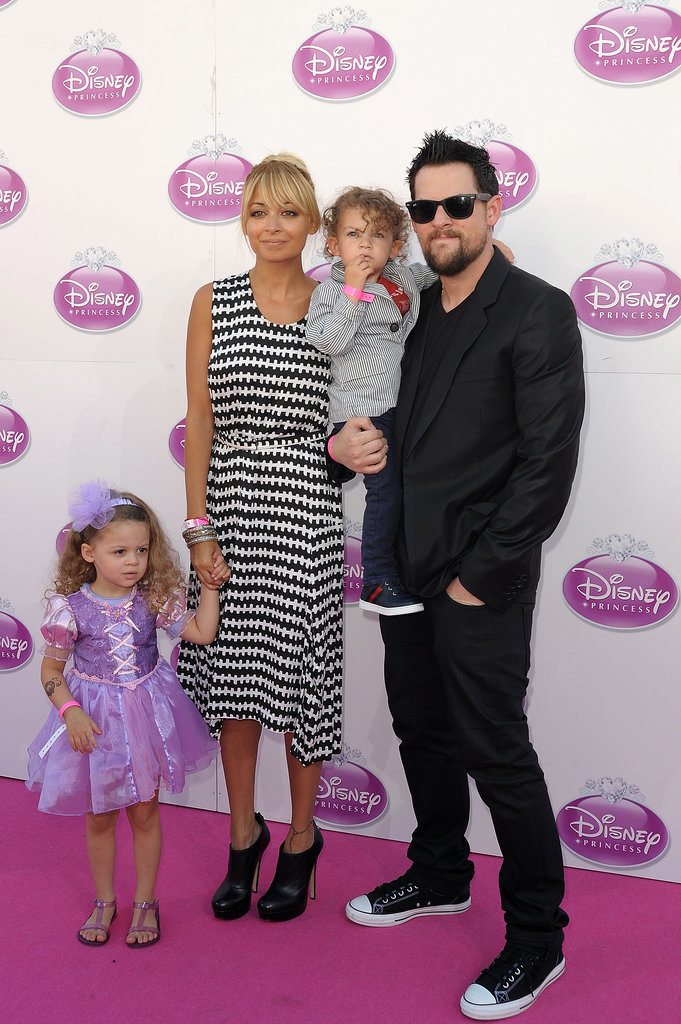 Nicole Richie and Joel Madden spent a fun family day with their little ones, Harlow and Sparrow, at a Disney event in London during October 2011.
Nicole Richie and Joel Madden spent a fun family day with their little ones, Harlow and Sparrow, at a Disney event in London during October 2011.
