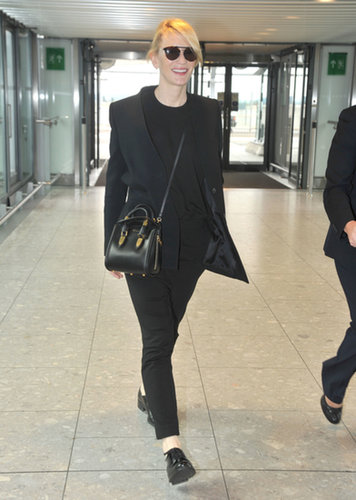 Cate Blanchett was impeccably chic in all black while catching a flight out of London. Her accessories — a mini Alexander McQueen crossbody bag, oxfords, and round sunglasses — really amped up her look.
Cate Blanchett was impeccably chic in all black while catching a flight out of London. Her accessories — a mini Alexander McQueen crossbody bag, oxfords, and round sunglasses — really amped up her look.
