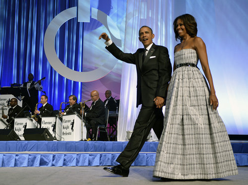Michelle Obama stole the show in a strapless plaid gown at the Congressional Black Caucus Foundation dinner in Washington DC.
Michelle Obama stole the show in a strapless plaid gown at the Congressional Black Caucus Foundation dinner in Washington DC.