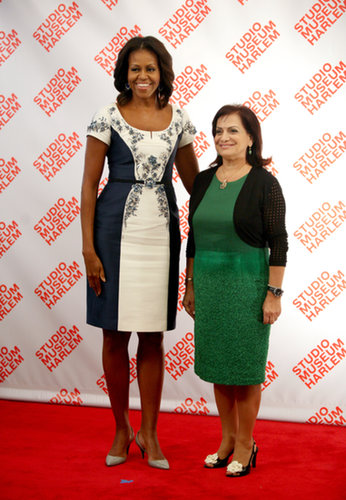 Michelle Obama looked lovely in a navy-and-white floral dress and gray slingback pumps at a first ladies lunch at the Studio Museum in Harlem in NYC.
Michelle Obama looked lovely in a navy-and-white floral dress and gray slingback pumps at a first ladies lunch at the Studio Museum in Harlem in NYC.