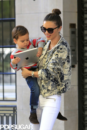 Miranda Kerr held onto her son, Flynn, as he played with an iPad.
Miranda Kerr held onto her son, Flynn, as he played with an iPad.