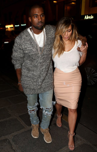 Kanye West kept his arm around Kim Kardashian when the couple went to dinner at Hotel Costes on Monday.
Kanye West kept his arm around Kim Kardashian when the couple went to dinner at Hotel Costes on Monday.