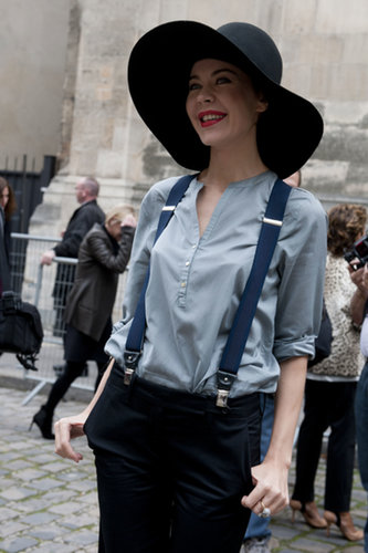 Ulyana Sergeenko shows of a floppy hat, suspenders, and a smile.
Ulyana Sergeenko shows of a floppy hat, suspenders, and a smile.