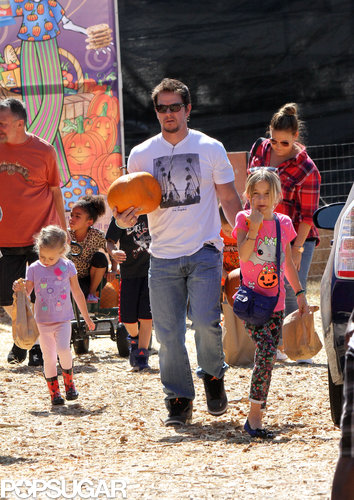 Mark Wahlberg walked through a pumpkin patch with his kids.
Mark Wahlberg walked through a pumpkin patch with his kids.