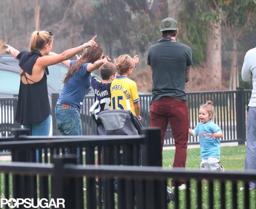 The Beckhams took to the soccer field to watch Harper play.
The Beckhams took to the soccer field to watch Harper play.