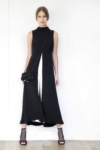 Jumpsuit Dress in Two-Toned Silk in Black & Cream ($1,295), Scandal Suede Sandal Bootie in Black ($895), Treasure Suede Cross Body Bag in Black ($650)
Photo courtesy of Tamara Mellon
Jumpsuit Dress in Two-Toned Silk in Black & Cream ($1,295), Scandal Suede Sandal Bootie in Black ($895), Treasure Suede Cross Body Bag in Black ($650)
Photo courtesy of Tamara Mellon