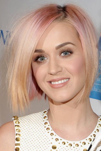 By the end of 2011, Katy lightened up her look with a sherbet-hued bob.
By the end of 2011, Katy lightened up her look with a sherbet-hued bob.