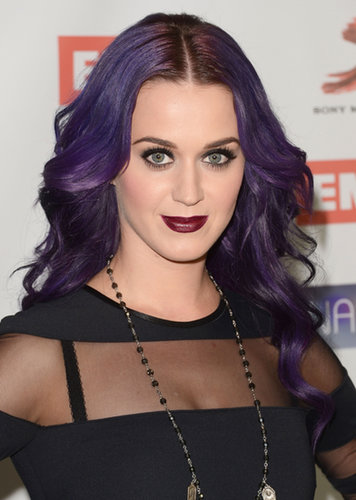 For an industry dinner in 2012, Katy tried out a more vampy look complete with purple-colored waves.
For an industry dinner in 2012, Katy tried out a more vampy look complete with purple-colored waves.