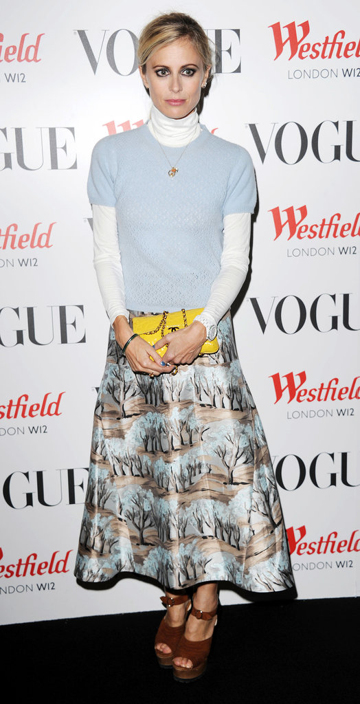 Laura Bailey layered preppy separates and added a bold yellow clutch at Westfield's London bash.
Laura Bailey layered preppy separates and added a bold yellow clutch at Westfield's London bash.
