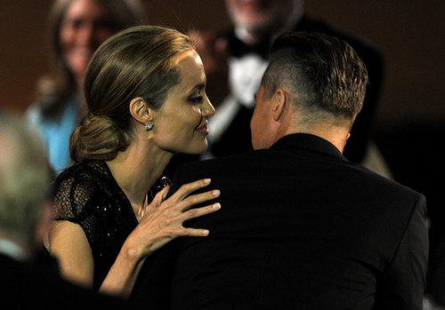 Angelina Jolie shared some sweet PDA with Brad Pitt at the event.
Angelina Jolie shared some sweet PDA with Brad Pitt at the event.
