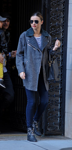 Miranda channeled a biker girl mentality in a quilted shearling coat and studded black boots.
Miranda channeled a biker girl mentality in a quilted shearling coat and studded black boots.