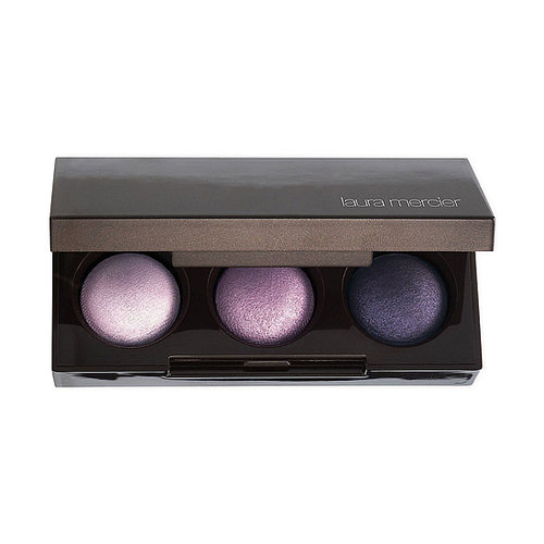 Laura Mercier is offering up the ultimate eye look this holiday with its versatile three-shadow Petite Baked Eye Colour Bonbons ($25). It's all you need for an unconventional aubergine smoky eye.
Laura Mercier is offering up the ultimate eye look this holiday with its versatile three-shadow Petite Baked Eye Colour Bonbons ($25). It's all you need for an unconventional aubergine smoky eye.
