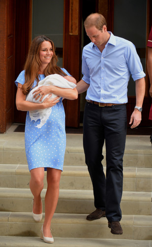 Prince William led Kate Middleton down the steps as they introduced the royal baby to the world.
Prince William led Kate Middleton down the steps as they introduced the royal baby to the world.