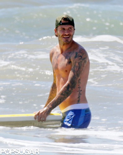 David Beckham hit the Malibu surf shirtless in August.
David Beckham hit the Malibu surf shirtless in August.