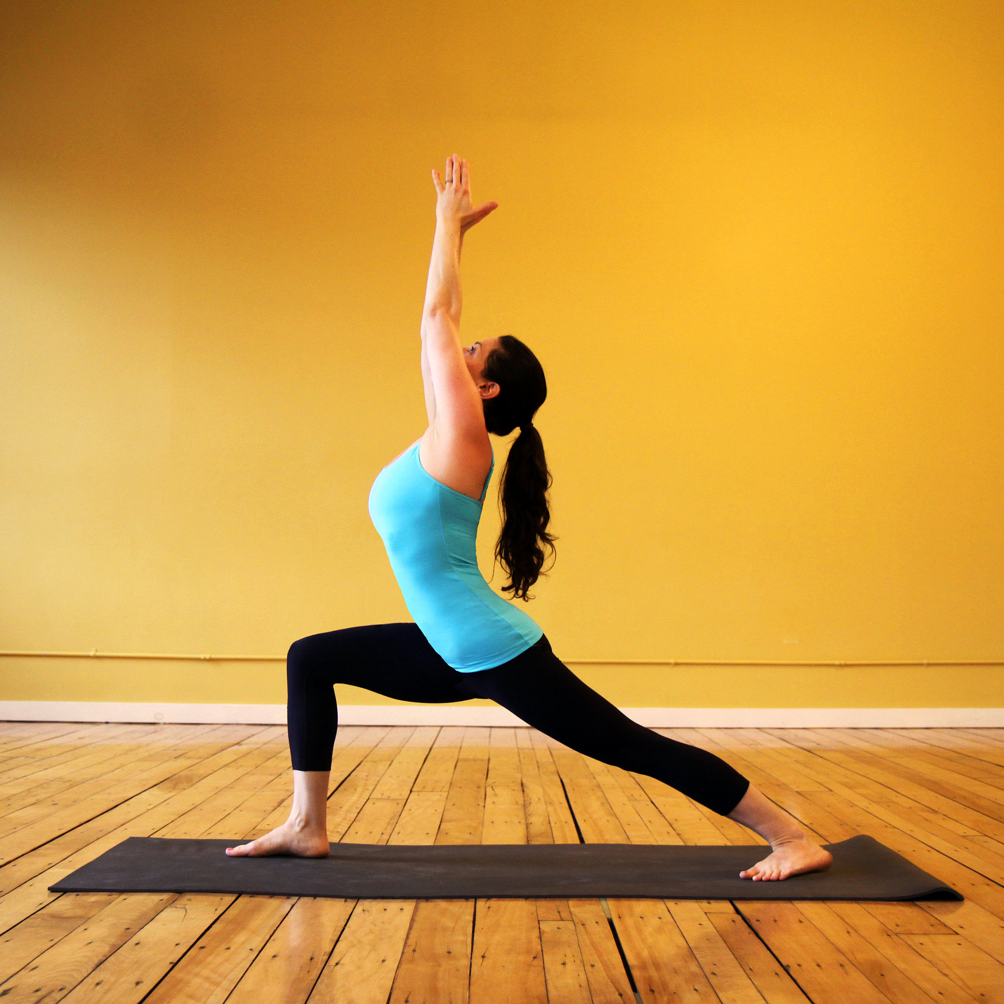 Warrior 1 Pose Light Your Fire A Beginner Yoga Sequence That Builds Heat Popsugar Fitness 