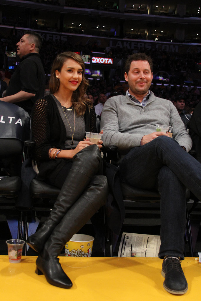 Jessica Alba kicked up her heels in Coach boots while sitting courtside at a Lakers game.
Jessica Alba kicked up her heels in Coach boots while sitting courtside at a Lakers game.