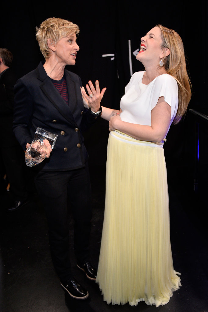 Something seriously cracked Drew Barrymore up while she was talking to Ellen DeGeneres backstage at the People's Choice Awards.
Something seriously cracked Drew Barrymore up while she was talking to Ellen DeGeneres backstage at the People's Choice Awards.