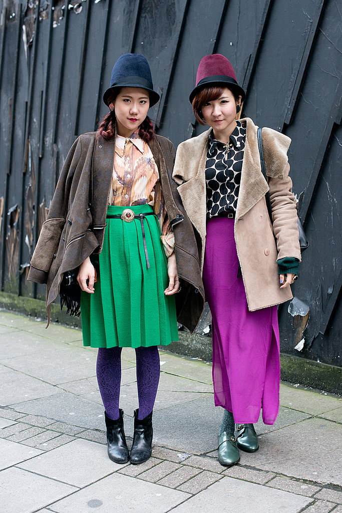 These showgoers kept it coordinated in bold colors and cloche hats.
These showgoers kept it coordinated in bold colors and cloche hats.