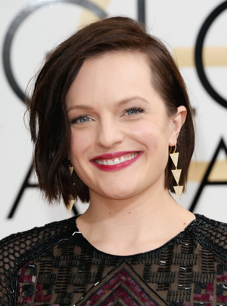 Elisabeth Moss complemented her beaded gown with fuchsia lips and coal-rimmed eyes.
Elisabeth Moss complemented her beaded gown with fuchsia lips and coal-rimmed eyes.
