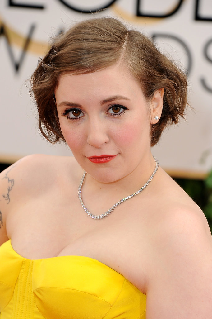 Lena Dunham was Spring-ready with rosy cheeks and red-hot lips. Thick black eyeliner and punk-rock waves juxtaposed her sweet beauty look.
Lena Dunham was Spring-ready with rosy cheeks and red-hot lips. Thick black eyeliner and punk-rock waves juxtaposed her sweet beauty look.