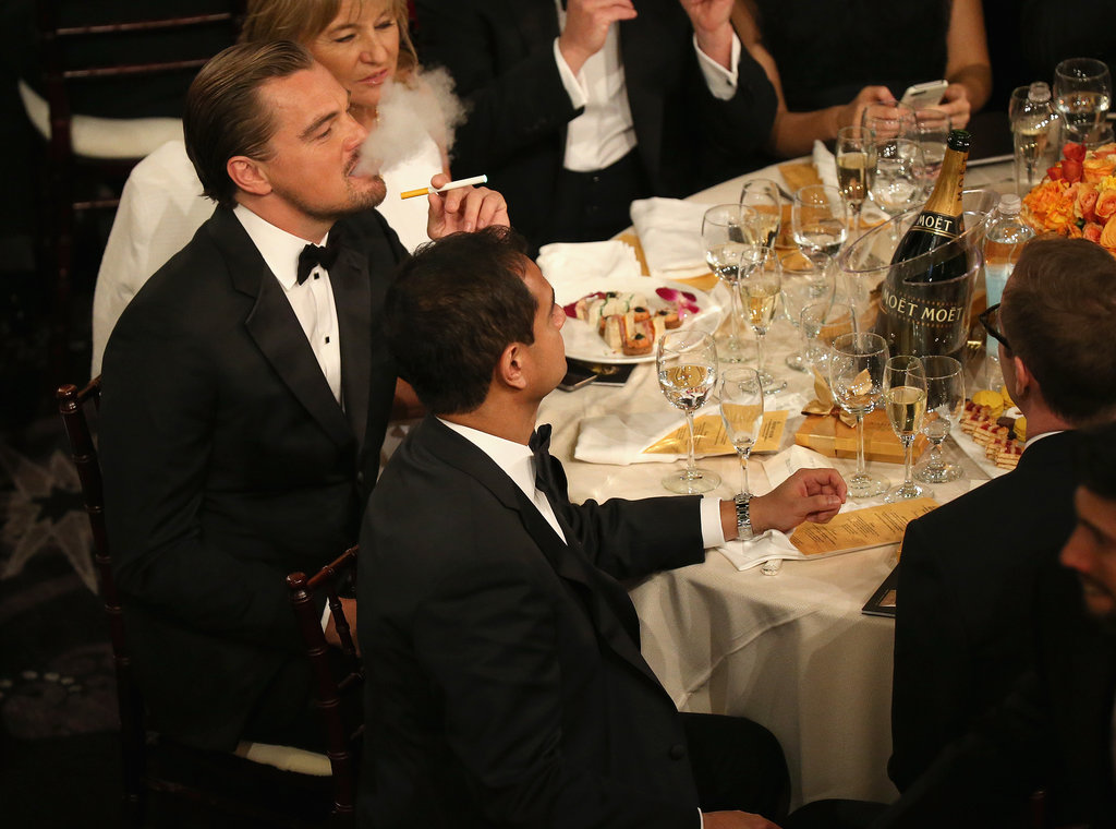 Leonardo DiCaprio lit up an electronic cigarette at his table, where he sat with the rest of his The Wolf of Wall Street cast.
Source: Christopher Polk/NBC/NBCU Photo Bank/NBC
Leonardo DiCaprio lit up an electronic cigarette at his table, where he sat with the rest of his The Wolf of Wall Street cast.
Source: Christopher Polk/NBC/NBCU Photo Bank/NBC