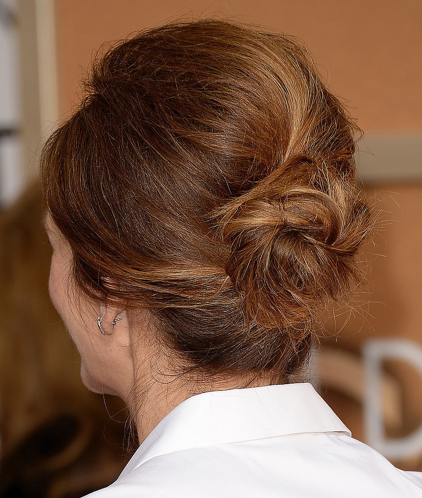 Julia's "modern twist on a '60s updo": get the skinny on her luscious locks here.
Julia's "modern twist on a '60s updo": get the skinny on her luscious locks here.