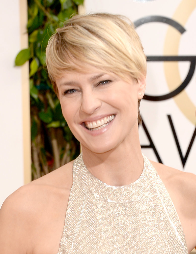 Robin Wright's smile brightened the red carpet like a ray of sunshine. A nude lip and effortless pixie cut rounded out her look.
Robin Wright's smile brightened the red carpet like a ray of sunshine. A nude lip and effortless pixie cut rounded out her look.