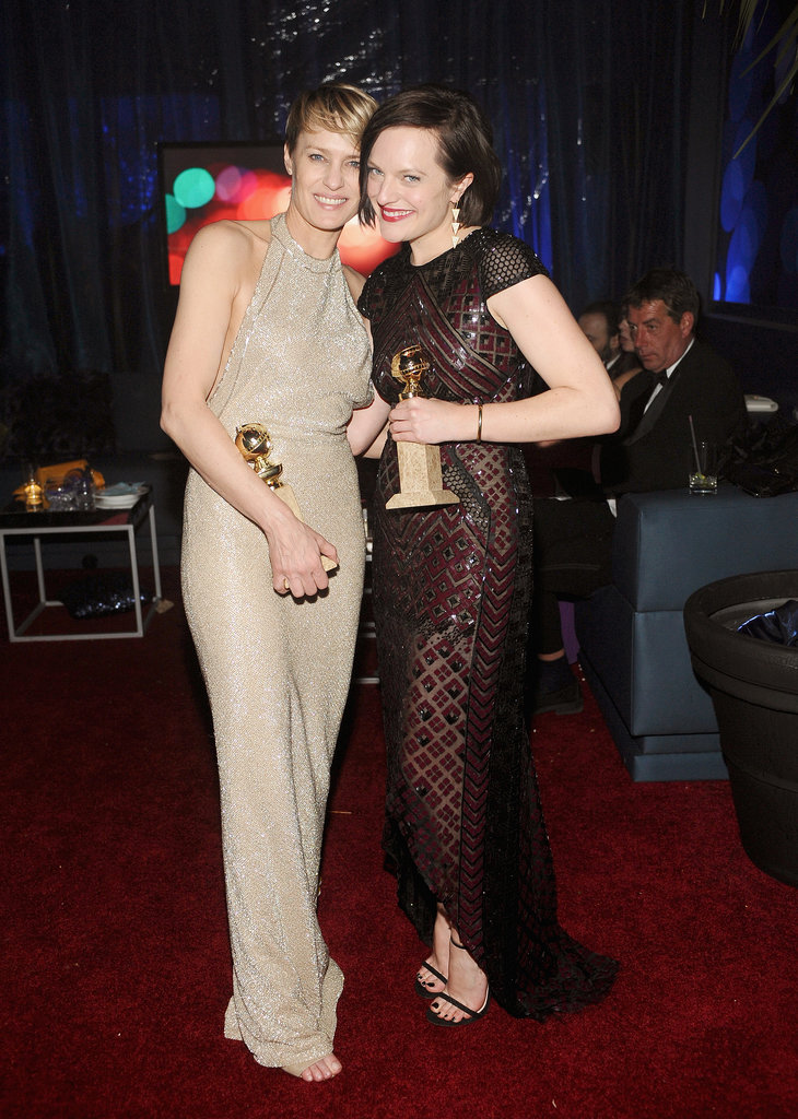 Robin Wright and Elisabeth Moss flaunted their new awards at the InStyle and Warner Bros. bash.
Robin Wright and Elisabeth Moss flaunted their new awards at the InStyle and Warner Bros. bash.