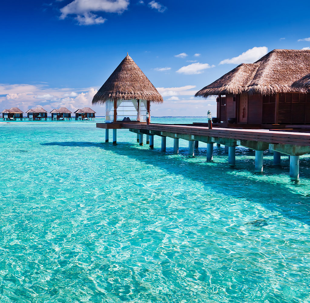Stay in an Overwater Bungalow Stay in an Overwater Bungalow