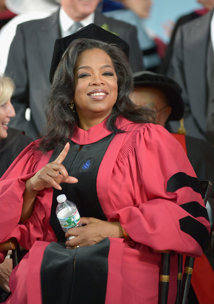 Oprah pointed from her seat while receiving an Honorary Doctor of Laws degree at Harvard University in 2013.
