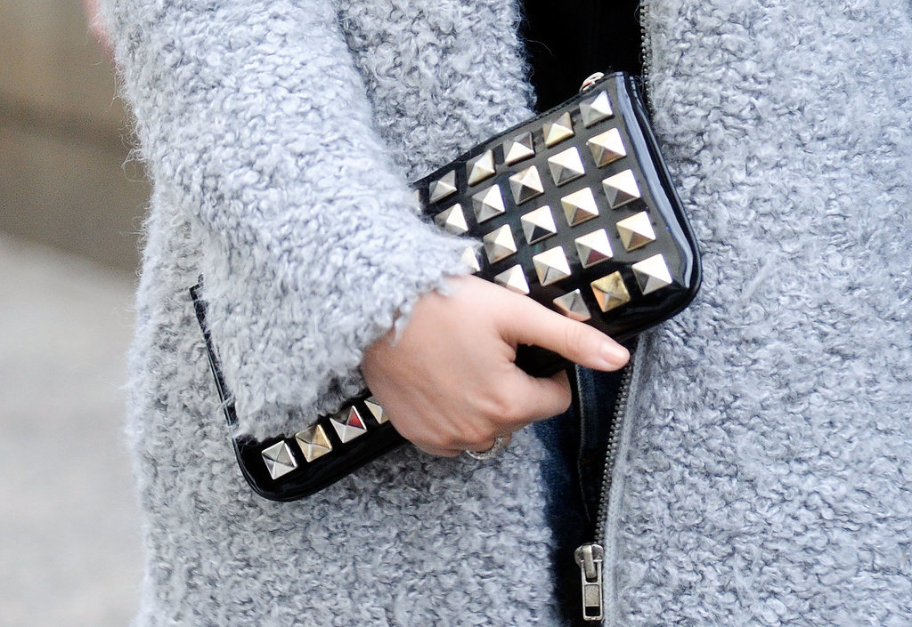 We're all about the contrast between a bouclé coat and tough-girl studded clutch.
We're all about the contrast between a bouclé coat and tough-girl studded clutch.