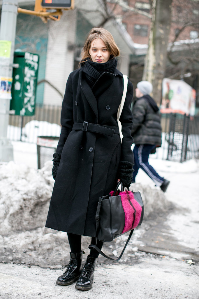 Don't write off her look as simple — just check out that tote.
