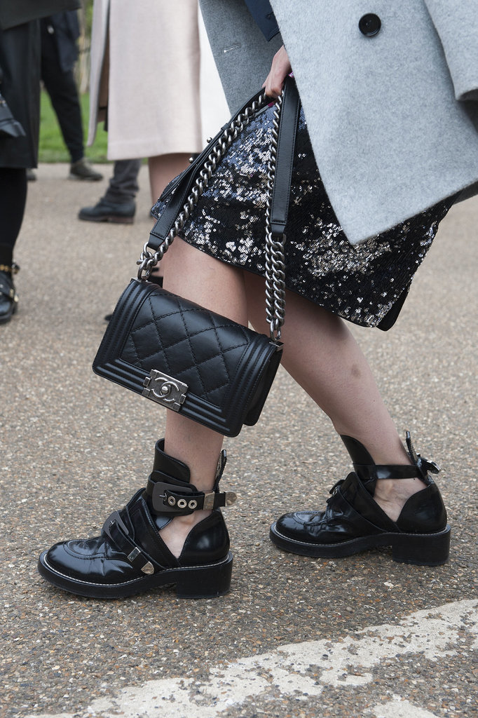 A tough-girl boot is a perfect counterpoint to a classic Chanel bag and sequins.
A tough-girl boot is a perfect counterpoint to a classic Chanel bag and sequins.