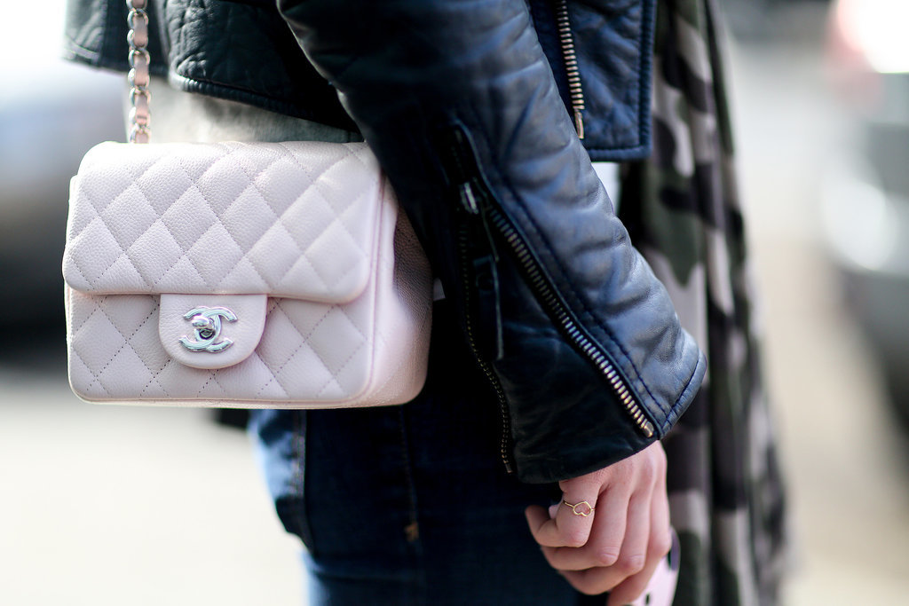 The prettiest counterpoint to a leather jacket is a petal-pink Chanel bag, don't you agree?
The prettiest counterpoint to a leather jacket is a petal-pink Chanel bag, don't you agree?