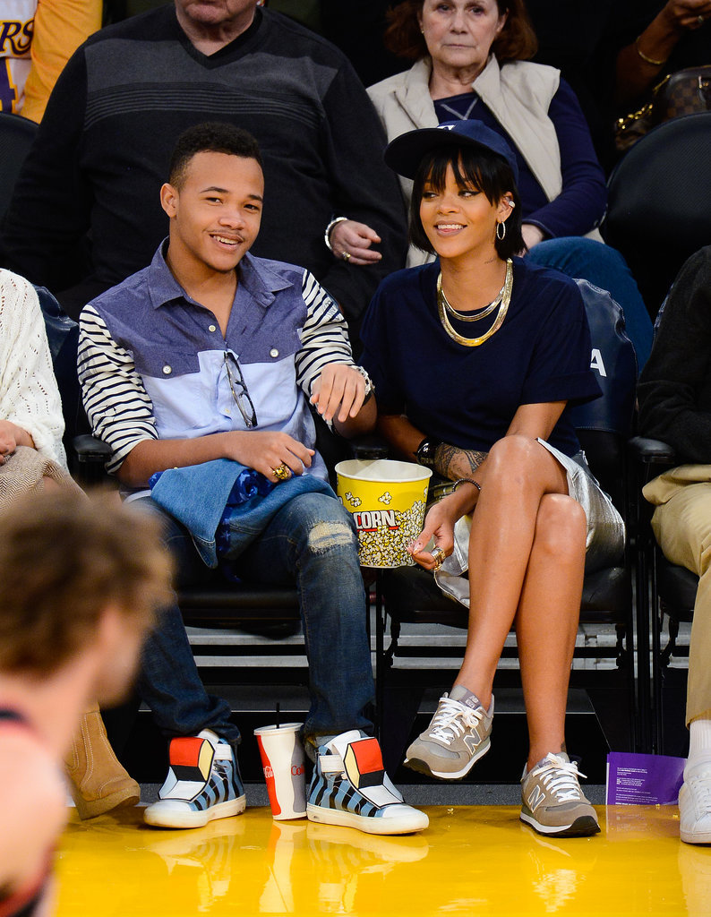 Our favorite basketball game look from Rihanna? The time she wore classic gray New Balance kicks to take in a December game with her little brother.
Our favorite basketball game look from Rihanna? The time she wore classic gray New Balance kicks to take in a December game with her little brother.