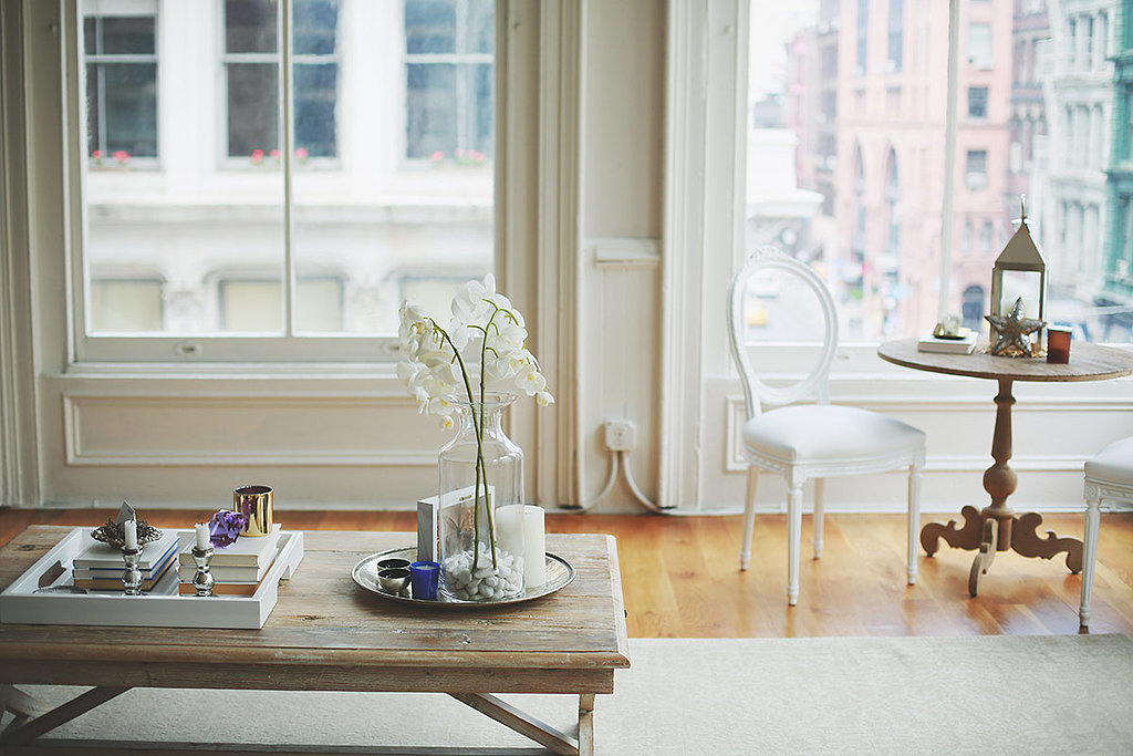 PS: Do you have any tips for creating distinct spaces in an open floor plan?
NS: Spend a lot of time on layout and use the largest pieces to anchor each space. Rugs and sofas are a great way to start — and don't go too small. If you have a larger space, use rugs as a way to tie all your pieces together. Pick a spot for the rug and try positioning furniture so that at least one leg of every piece (except the TV console) is on the rug. By allowing all pieces a common touch point, the space will feel anchored and intimate.
Photo by Chellis Michael Photography
PS: Do you have any tips for creating distinct spaces in an open floor plan?
NS: Spend a lot of time on layout and use the largest pieces to anchor each space. Rugs and sofas are a great way to start — and don't go too small. If you have a larger space, use rugs as a way to tie all your pieces together. Pick a spot for the rug and try positioning furniture so that at least one leg of every piece (except the TV console) is on the rug. By allowing all pieces a common touch point, the space will feel anchored and intimate.
Photo by Chellis Michael Photography