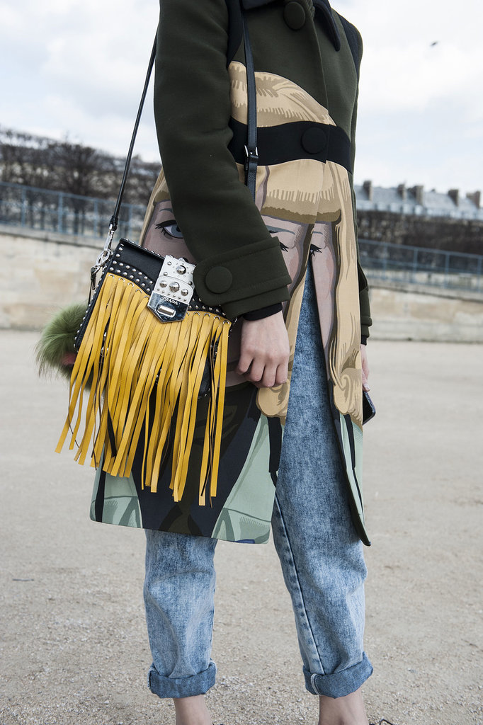 She added even more drama to a Prada face coat with her high-impact fringed bag.
She added even more drama to a Prada face coat with her high-impact fringed bag.