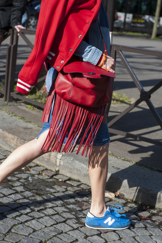 We can't resist her red accents — or that fringe.
We can't resist her red accents — or that fringe.