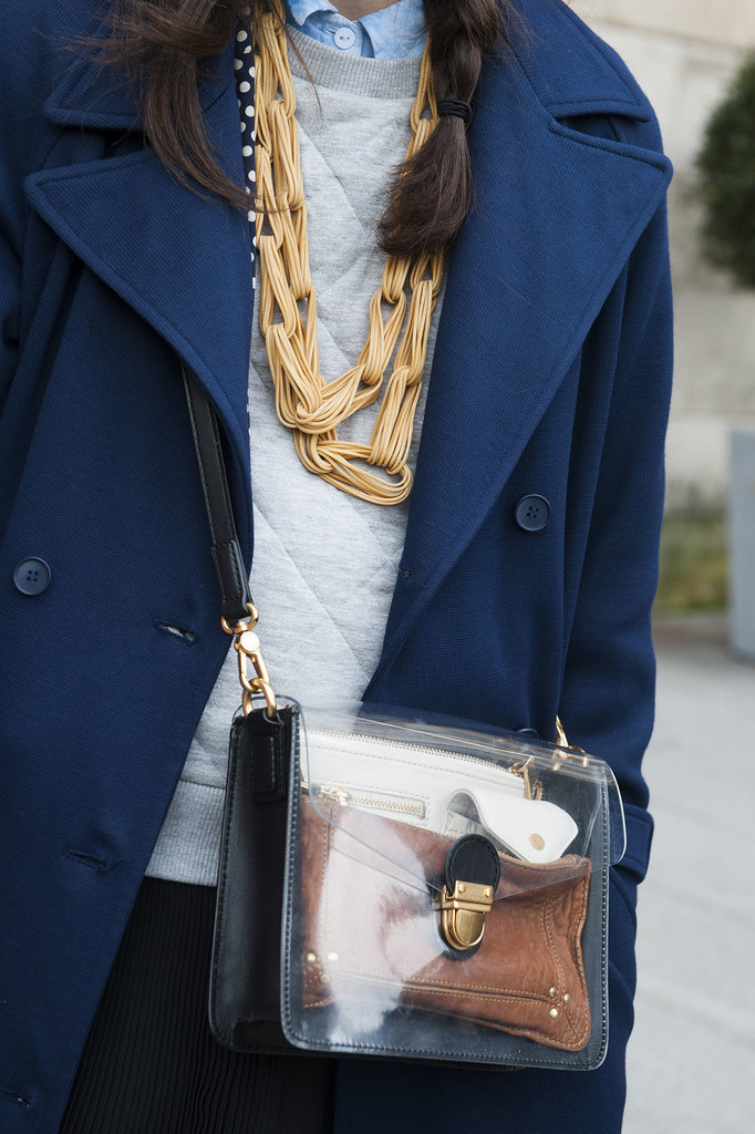 Gold jewels and a see-through crossbody bag make this a notice-me look.
Gold jewels and a see-through crossbody bag make this a notice-me look.