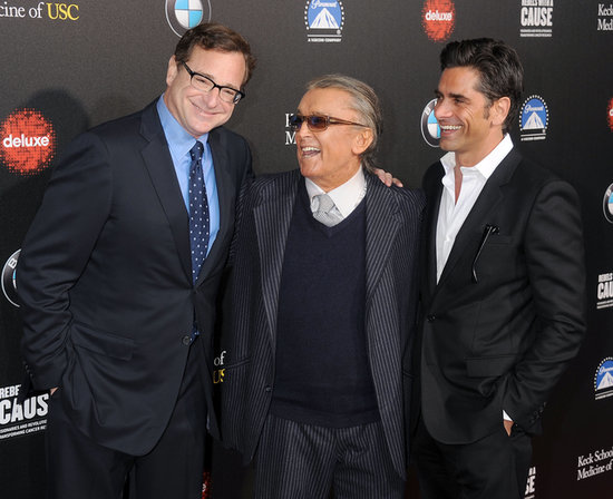 It was another Full House reunion as John Stamos and Bob Saget posed together. They sandwiched film producer Robert Evans in the middle. It was another Full House reunion as John Stamos and Bob Saget posed together. They sandwiched film producer Robert Evans in the middle.