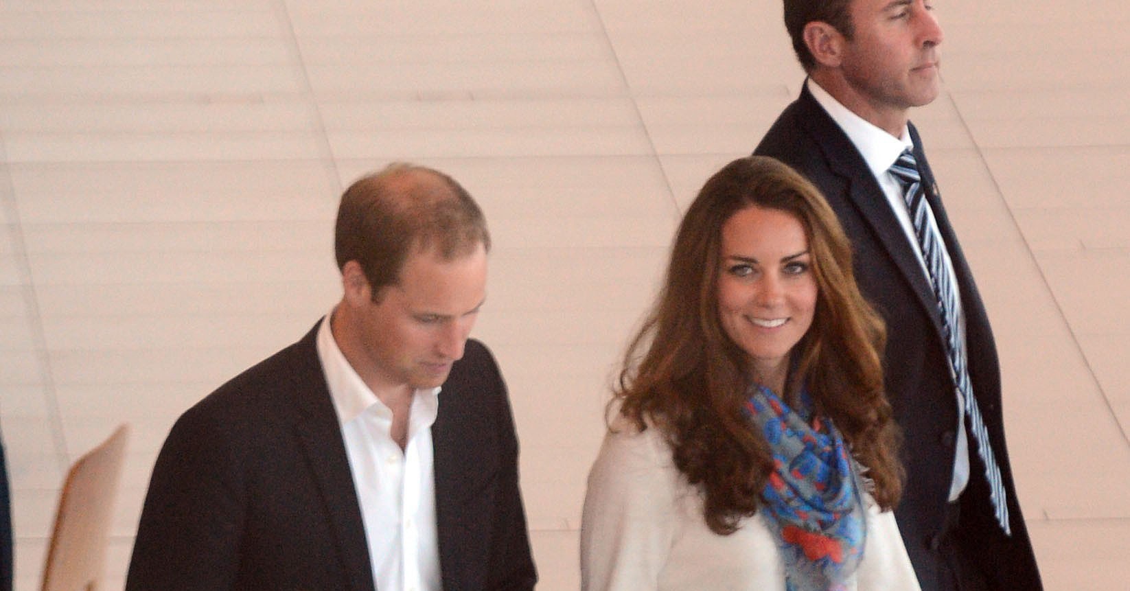 Kate Middleton wore a scarf and sweater with jeans to travel with