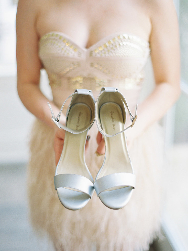 8. Bride Holding Shoes 8. Bride Holding Shoes