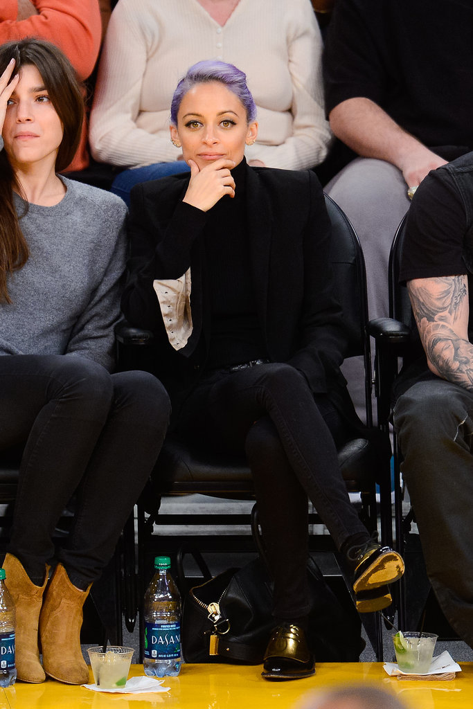 The most shocking part of Nicole Richie's all-black outfit? Her lilac hair! The bright hue was the only thing that could've distracted us from her chic gold and black oxfords.
The most shocking part of Nicole Richie's all-black outfit? Her lilac hair! The bright hue was the only thing that could've distracted us from her chic gold and black oxfords.