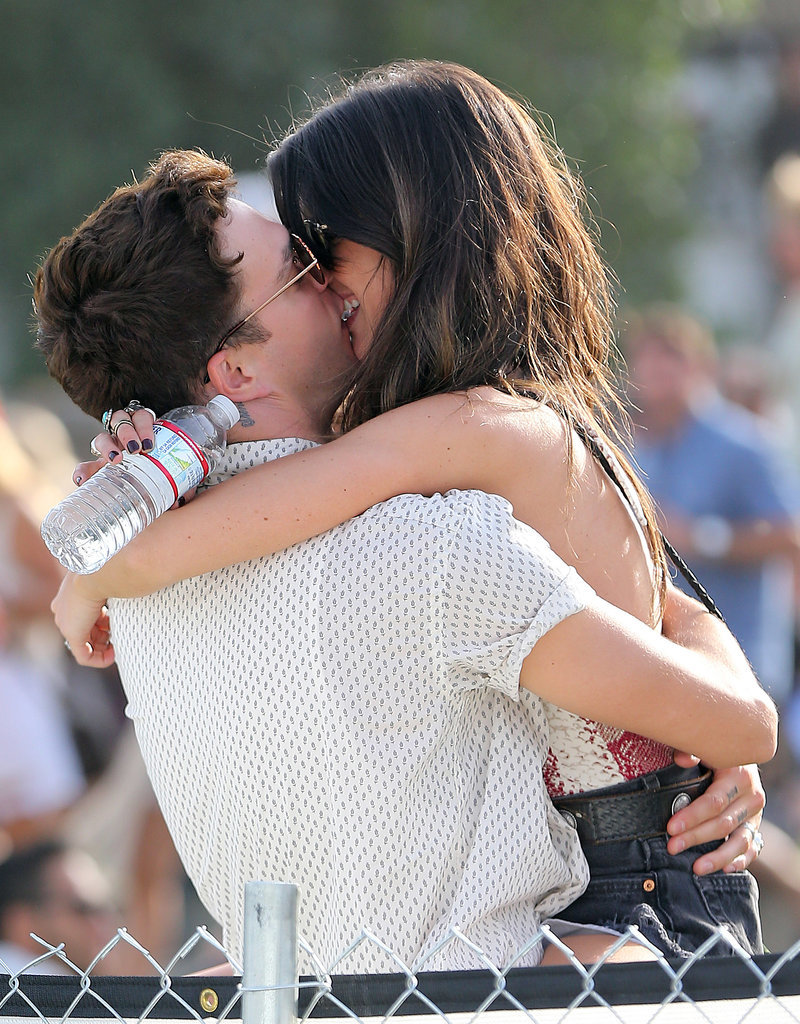 Shenae Grimes and Josh Beech laughed as they smooched. 