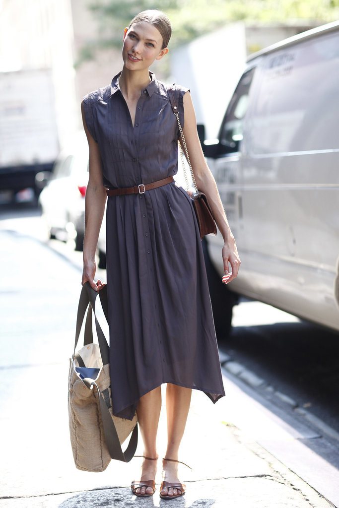 Karlie Kloss's Summer style isn't complicated — just look for a ladylike shirtdress and cinch the waist with a thin leather belt. Polished enough for your 9-to-5 with the right shoes!
Karlie Kloss's Summer style isn't complicated — just look for a ladylike shirtdress and cinch the waist with a thin leather belt. Polished enough for your 9-to-5 with the right shoes!