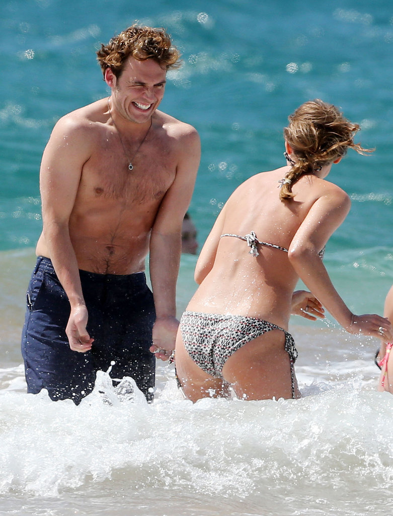 In April 2014, Sam Claflin splashed around with his wife, Lauren Haddock, in Hawaii.
In April 2014, Sam Claflin splashed around with his wife, Lauren Haddock, in Hawaii.